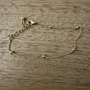 Gold bracelet with beads